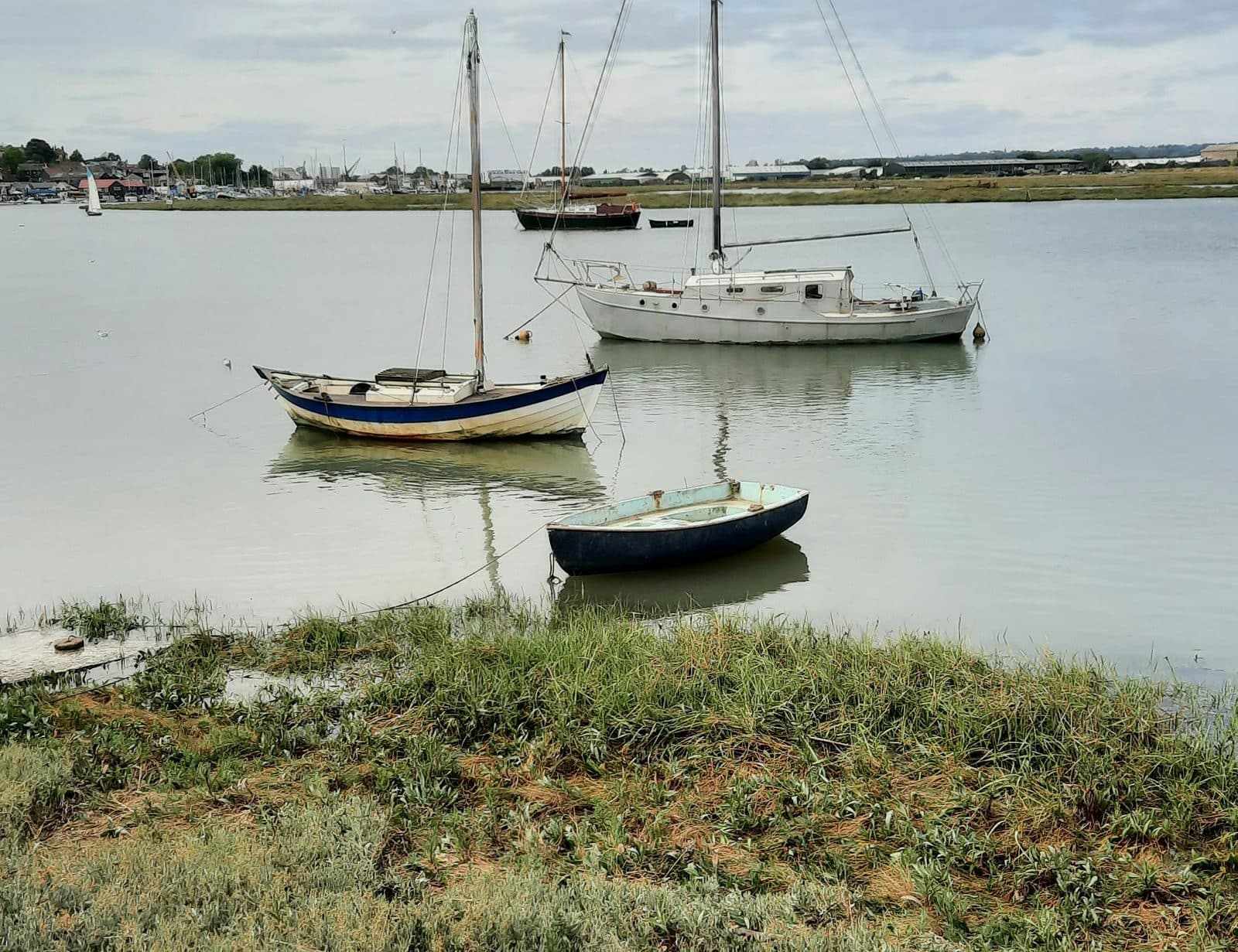 Small boats moored on the saltmarsh at Maldon on the Blackwater estuary
