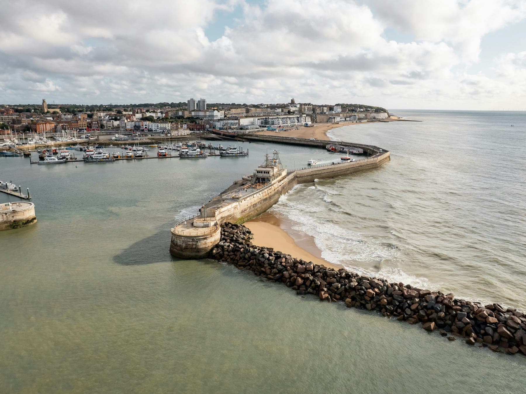 An aerial view of the Royal Harbour at Ramsgate, with its curved harbour walls and marina